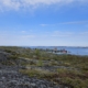 Kuva kalliolta alas kylään ja vierasvenesatamaan, Aspö, Parainen.